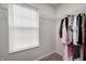 Well-organized walk-in closet with built-in shelving and ample hanging space, maximizing storage solutions at 6623 Pasco Ln, Plainfield, IN 46168
