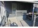 Back porch with gray painted deck and steps at 733 S Emerson Ave, Indianapolis, IN 46203