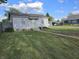 Charming single-story home with a well-maintained front yard and inviting entrance at 733 S Emerson Ave, Indianapolis, IN 46203