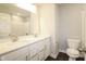 Bathroom with double vanity, large mirror, and a toilet at 9812 Ridgecrest Ln, McCordsville, IN 46055