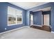 Bright bedroom with large window, plush carpeting, and fresh paint at 9812 Ridgecrest Ln, McCordsville, IN 46055