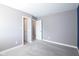 Comfortable bedroom with plush carpeting, a large closet, and a soothing gray color scheme at 9812 Ridgecrest Ln, McCordsville, IN 46055