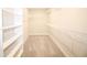 Spacious walk-in closet featuring ample shelving and carpeted flooring at 9812 Ridgecrest Ln, McCordsville, IN 46055