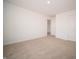 Bright bedroom with neutral carpet and trim, plus a walk-in closet for ample storage space at 101 Ames Dr, Whiteland, IN 46184