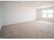 A light, bright bedroom with a large window lets in plenty of natural light at 101 Ames Dr, Whiteland, IN 46184