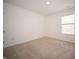 Inviting bedroom featuring natural light and neutral carpet, creating a calming and welcoming space at 101 Ames Dr, Whiteland, IN 46184