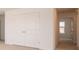 Hallway features double doors, a window, and entrance to another room at 101 Ames Dr, Whiteland, IN 46184