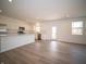 Modern kitchen with white cabinets, stainless steel appliances, and open layout to dining area at 101 Ames Dr, Whiteland, IN 46184