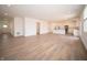 A wide open view of a living room and modern kitchen combination showing lots of natural light at 101 Ames Dr, Whiteland, IN 46184