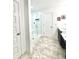 Bathroom features a frameless glass shower, and stylish vanity with modern fixtures at 11034 Saddlebred Dr, Indianapolis, IN 46239