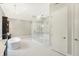 Bright Primary bathroom with a soaking tub, glass shower, and refined fixtures at 11710 Cold Creek Ct, Zionsville, IN 46077