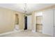 Bedroom featuring ensuite bathroom and walk-in closet with closet organizers at 11710 Cold Creek Ct, Zionsville, IN 46077