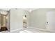Bedroom featuring an archway to the bathroom and a doorway to another room at 11710 Cold Creek Ct, Zionsville, IN 46077
