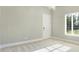 Bedroom featuring a window with natural light and a door at 11710 Cold Creek Ct, Zionsville, IN 46077