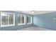 Bedroom with a ceiling fan and three bright windows providing lots of natural light at 11710 Cold Creek Ct, Zionsville, IN 46077