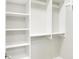 Walk-in closet features custom shelving and ample storage space at 11710 Cold Creek Ct, Zionsville, IN 46077