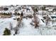 Wide aerial view of a home surrounded by a snow-covered landscape, highlighting its serene and spacious setting at 1307 W 161St St, Westfield, IN 46074