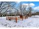 Fully fenced and gated backyard with a playhouse perfect for outdoor fun and activities at 1307 W 161St St, Westfield, IN 46074