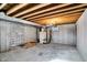 Unfinished basement with exposed ceiling beams offers opportunity for customization and additional living space at 1307 W 161St St, Westfield, IN 46074