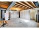 Unfinished basement with exposed ceiling beams offers opportunity for customization and additional living space at 1307 W 161St St, Westfield, IN 46074