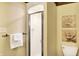 Bathroom featuring a glass enclosed shower, toilet and rose themed decorations at 1307 W 161St St, Westfield, IN 46074