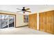 Bedroom with balcony access, large closet, ceiling fan, and natural light at 1307 W 161St St, Westfield, IN 46074