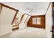 Inviting bedroom featuring exposed beams, soft carpet, and a window that overlooks a serene winter scene at 1307 W 161St St, Westfield, IN 46074