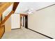Open bedroom featuring exposed beams, a neutral color scheme, and a doorway that gives depth to the space at 1307 W 161St St, Westfield, IN 46074
