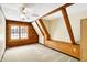 Spacious bedroom with exposed beams, a ceiling fan, and a window that looks out to a beautiful wintry landscape at 1307 W 161St St, Westfield, IN 46074