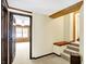 Hallway featuring a set of stairs and a doorway leading to a room with windows at 1307 W 161St St, Westfield, IN 46074