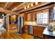 Bright kitchen with stainless steel appliances, wood cabinets and views into the next room at 1307 W 161St St, Westfield, IN 46074