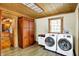 Laundry room with new washer and dryer and plenty of space for storage at 1307 W 161St St, Westfield, IN 46074