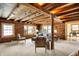 Cozy living room with exposed wood beams, natural light, and comfortable seating at 1307 W 161St St, Westfield, IN 46074