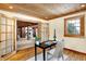 Light-filled office features wood floors, french doors, and large windows at 1307 W 161St St, Westfield, IN 46074