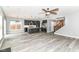 Beautiful open concept living space with kitchen, hardwood floors and a stairway to the second floor at 1324 Trailside Dr, Greenwood, IN 46143