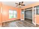 Bright office space with hardwood floors, a ceiling fan, lots of natural light and a french door entrance at 1324 Trailside Dr, Greenwood, IN 46143