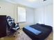 Cozy bedroom with comfortable bed and space-saving furniture at 2414 W 16Th St, Anderson, IN 46016