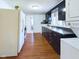 Functional kitchen featuring modern appliances and a connected laundry area at 2414 W 16Th St, Anderson, IN 46016