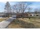 Ranch house with a long driveway and a large backyard at 3052 S Fielding Rd, New Palestine, IN 46163