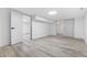 Spacious basement bedroom with light wood flooring and ample natural light at 3052 S Fielding Rd, New Palestine, IN 46163