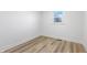 Spacious bedroom with hardwood floors and large window at 3052 S Fielding Rd, New Palestine, IN 46163
