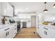 Modern kitchen featuring white shaker cabinets and stainless steel appliances at 3052 S Fielding Rd, New Palestine, IN 46163
