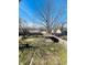 Spacious fenced backyard features a detached structure, shed, and plenty of room at 310 S Gerrard Dr, Indianapolis, IN 46241