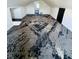 Attic bedroom featuring neutral paint, natural light and modern black and gray carpet at 310 S Gerrard Dr, Indianapolis, IN 46241