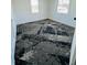Bedroom with gray and black patterned carpet and white walls, featuring two windows at 310 S Gerrard Dr, Indianapolis, IN 46241
