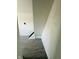 Hallway featuring gray tile floors and natural light at 310 S Gerrard Dr, Indianapolis, IN 46241