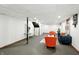 Comfortable finished basement with modern furniture, accent rugs, and stylish decor at 4646 Rocky Knob Ln, Indianapolis, IN 46254
