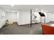 Finished basement with neutral carpet, white walls, decorative touches, and ample space at 4646 Rocky Knob Ln, Indianapolis, IN 46254