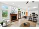 Bright living area with fireplace and views to the back deck at 4646 Rocky Knob Ln, Indianapolis, IN 46254