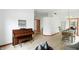 Spacious living area blends modern decor and traditional elements, complete with piano at 4646 Rocky Knob Ln, Indianapolis, IN 46254